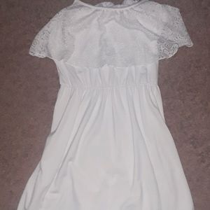 A white dress frilly on top